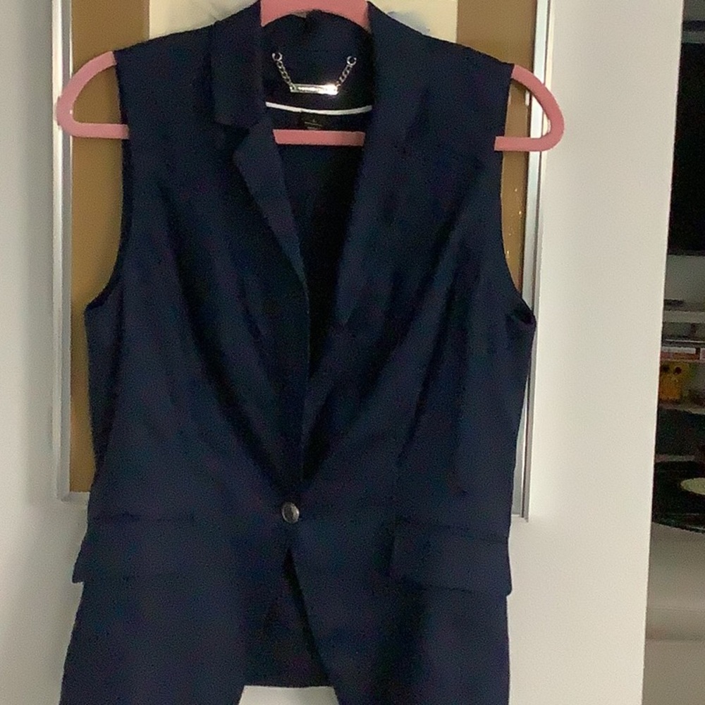 White House black market vest.